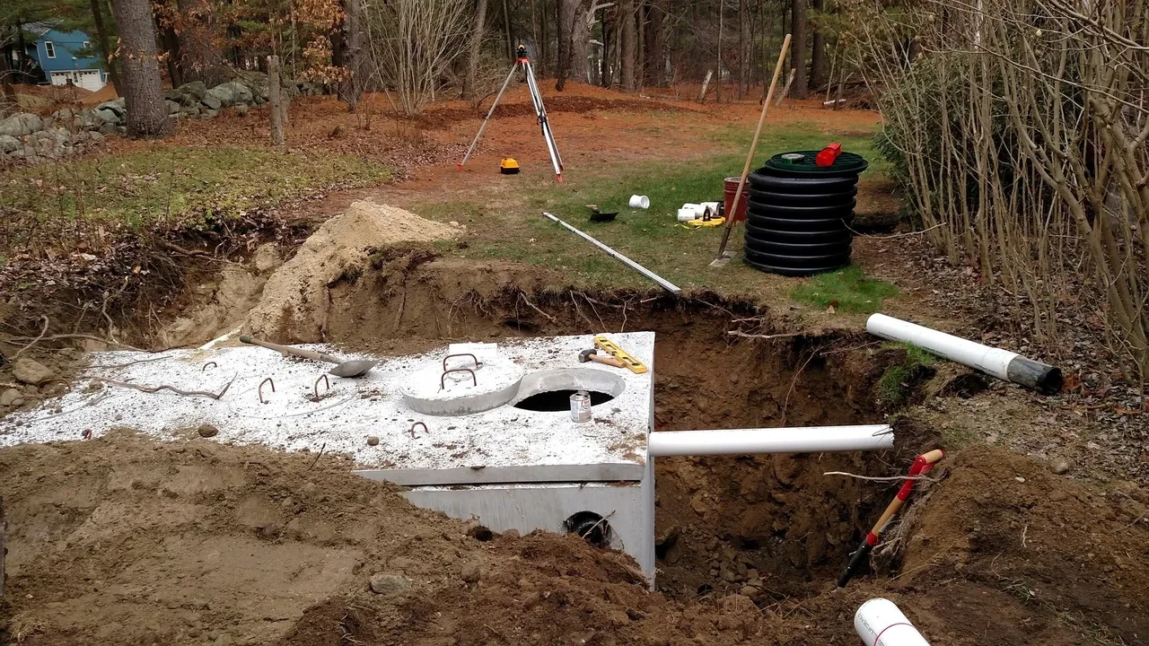 David Mercurio & Son CAT excavator at septic leach field installation